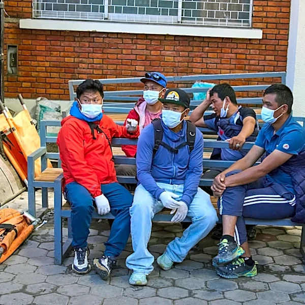 Rescue teams search Nepal mountain for 12 swept by avalanche