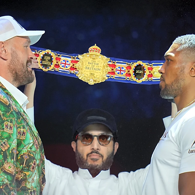 Fury and Joshua are mostly smiles as they take stage together ahead of Cardiff bout