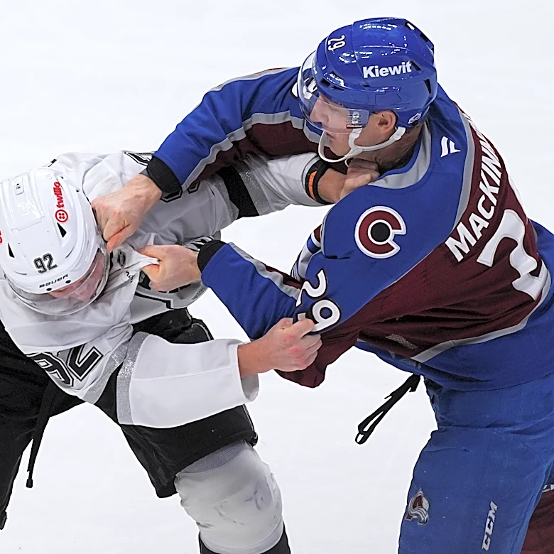 MacKinnon has 2 goals and a rare fight in the Avs' 8-4 victory over the Kings in opener