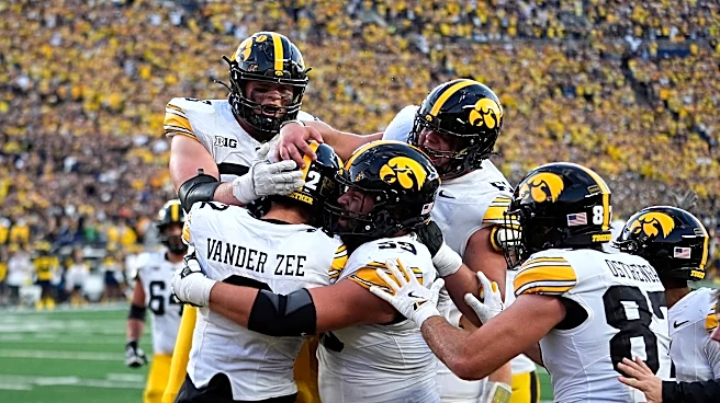 Big Ten schedule has No. 14 Iowa attempting to beat Michigan and Ohio State in back-to-back weeks