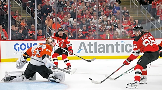 Olympic hero Jack Hughes scores in OT to lift the Devils over the Flyers 3-2