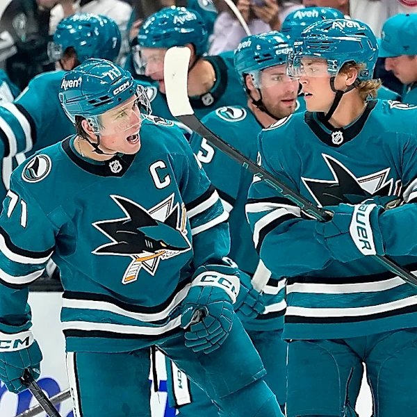 Luca Cagnoni scores in OT in the Sharks' season-opening victory over the Panthers