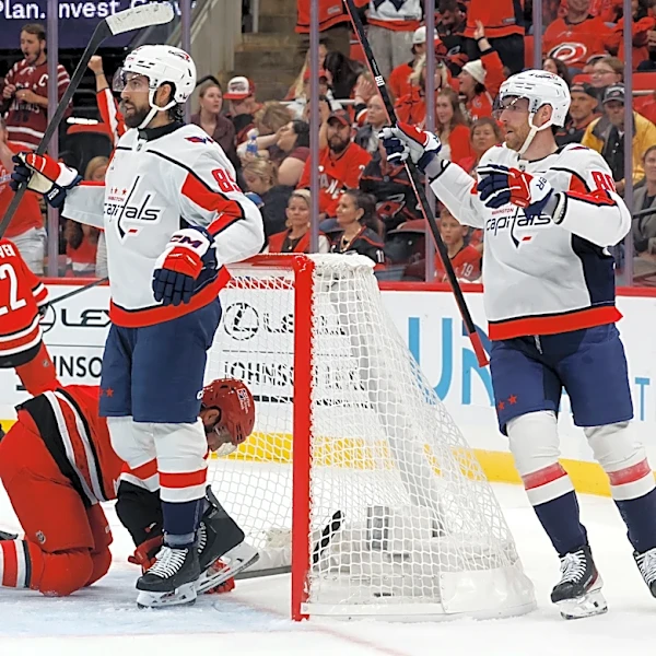 Tuch scores twice in his first game for Washington, helping the Capitals beat the Hurricanes 5-2