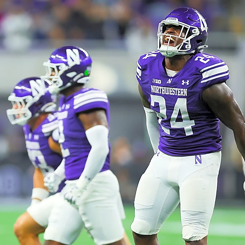 Caleb Komolafe stars as Northwestern rushes past Penn State 34-13 in 1st game at Ryan Field