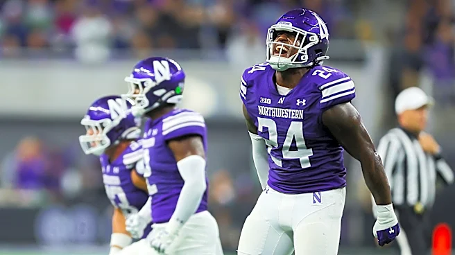 Caleb Komolafe stars as Northwestern rushes past Penn State 34-13 in 1st game at Ryan Field