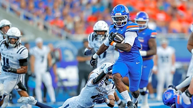 Madsen, No. 22 Boise State beat Utah State 37-18 in the teams' inaugural Pac-12 game