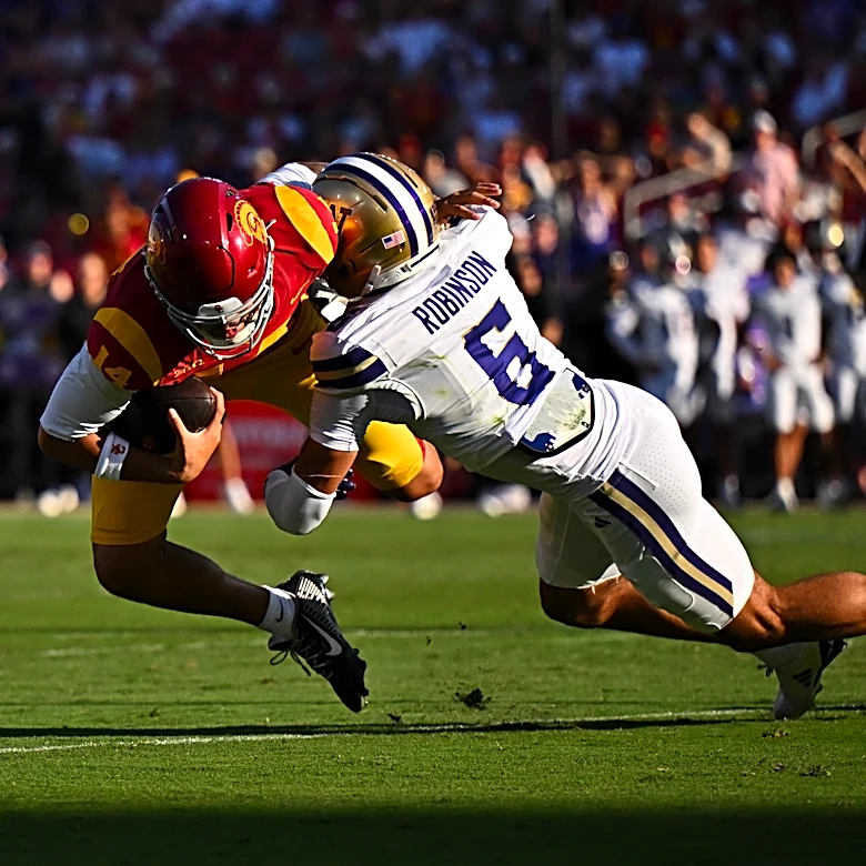 No. 18 USC rallies past Washington 25-21 with Stewart's fumble return TD, more big defensive plays