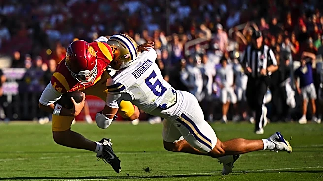 No. 18 USC rallies past Washington 25-21 with Stewart's fumble return TD, more big defensive plays