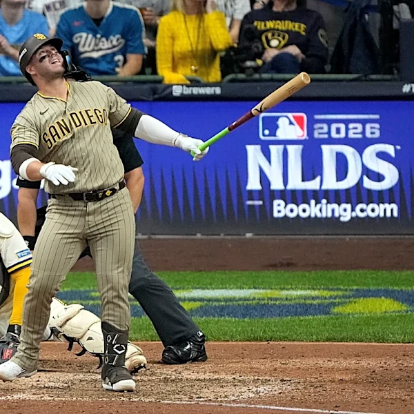 Brewers get a big assist from their ballpark roof to beat the Padres 3-2 in NLDS opener