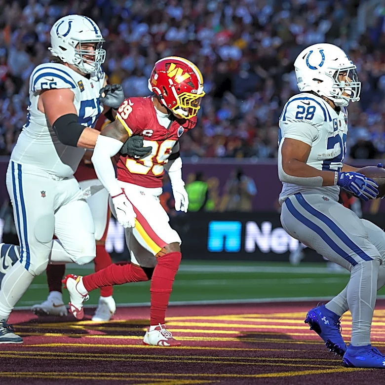 Taylor runs for 2 TDs and Colts beat Commanders 30-13 in London