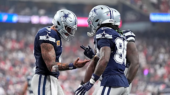 CeeDee Lamb’s late TD caps a wild Cowboys rally to beat winless Texans 34-30