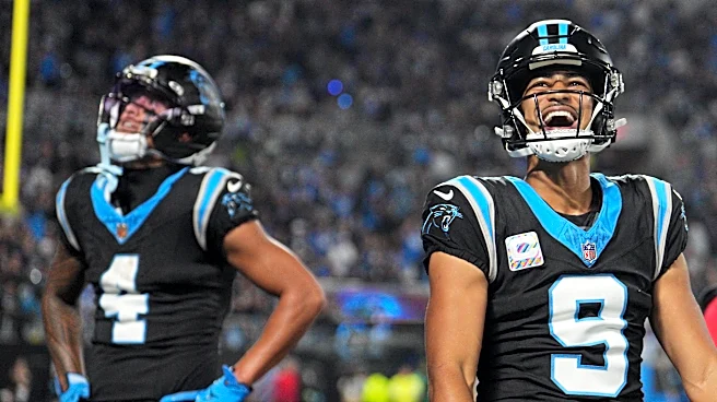 Bryce Young and Tetairoa McMillan connect for 2 TDs to lead Panthers past Lions 32-26