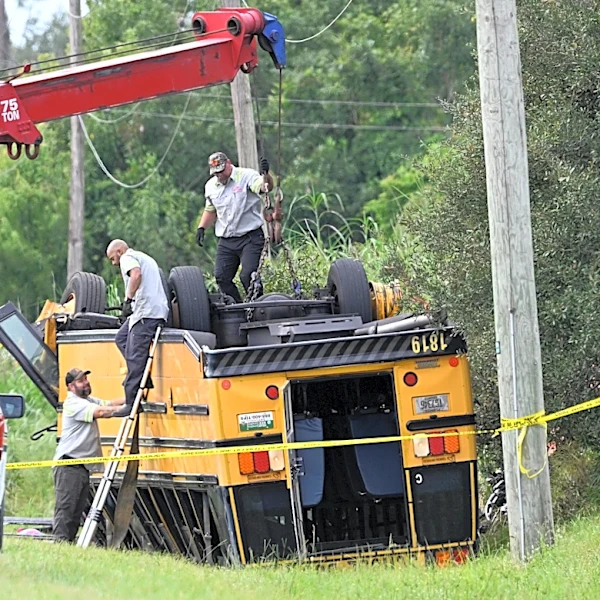 2 people killed, including a student, after Florida school bus rolls over in crash