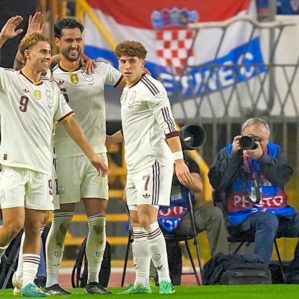 Merino comes up clutch again for Spain as Kane marks record-setting match with 2 goals for England