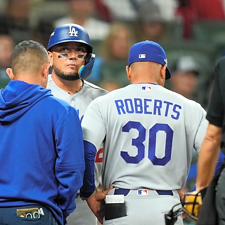 Dodgers hold out Miguel Rojas due to sore back. Ronald Acuña Jr. is starting in RF for Braves