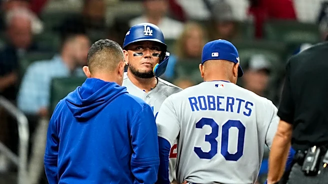 Dodgers hold out Miguel Rojas due to sore back. Ronald Acuña Jr. is starting in RF for Braves