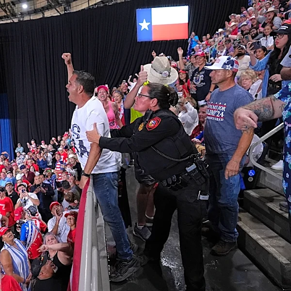 Trump interrupted by protesters as he fights to rally Texas voters behind Paxton in US Senate race
