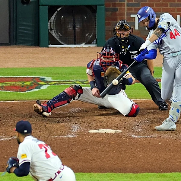 Pages delivers go-ahead single in 7th as Dodgers beat Braves 4-1 to clinch NL Division Series