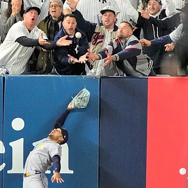 Fan interference denies Anthony Volpe a tying homer as Yankees get swept by Rays in ALDS