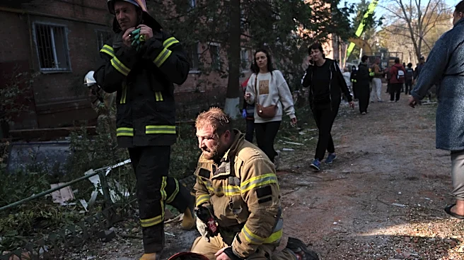 Rescuers pull bodies from rubble as Ukraine's death toll rises to 22 from a Russian missile strike