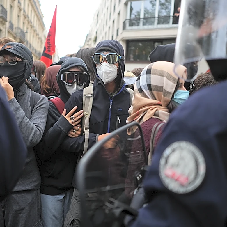 Police fire tear gas at a barricaded high school in Paris as school protests show no sign of ending