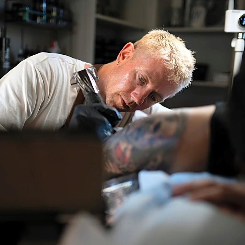 A former SSPX priest embraces life as a gay man and tattoo artist