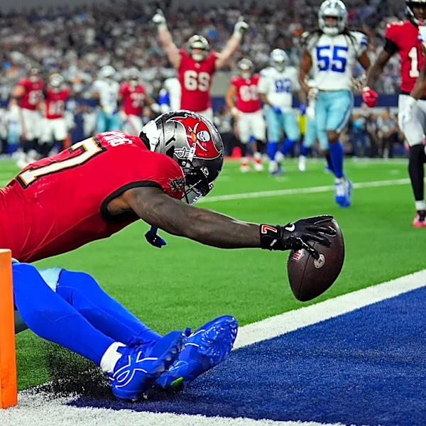Bucky Irving and rookie QB Jalon Daniels help Bucs beat sloppy Cowboys 24-16 for 1st win of season