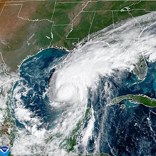 El Niño's storm-killer winds and climate's warming waters in fight over future of Hurricane Isaias