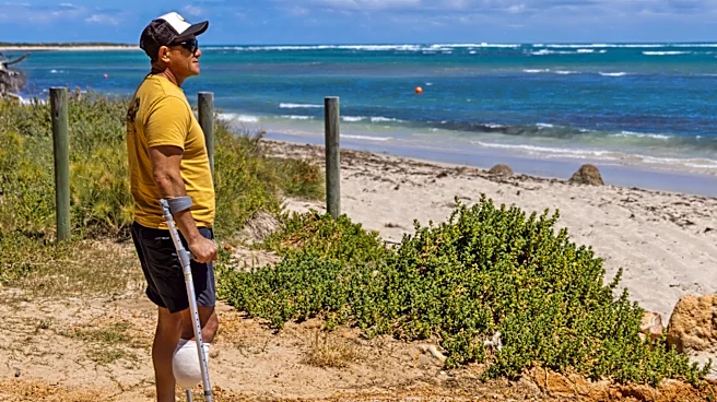 Australian shark attack survivor says predator was 'winking back' at him as he fought it off