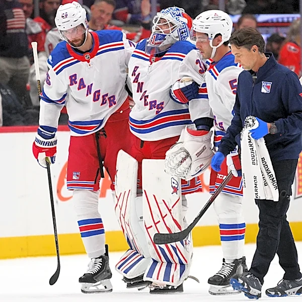 Rangers goalie Igor Shesterkin helped off ice with leg injury after awkward fall against Capitals