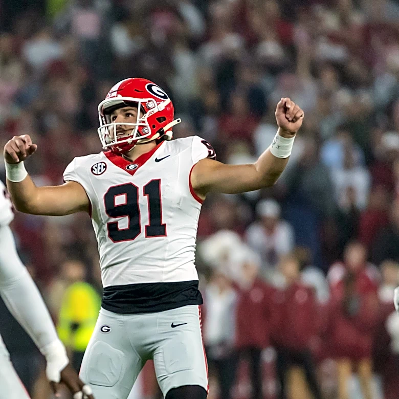 Dwight Phillips Jr. and No. 2 Georgia run past No. 6 Alabama 20-17 in an SEC clash
