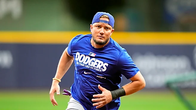 Dodgers keep infielder Miguel Rojas on their NLCS roster against the Brewers