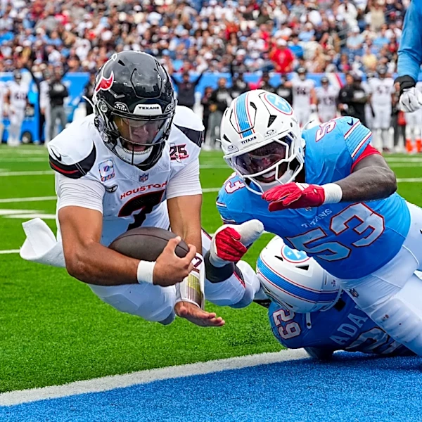 Stroud runs for a TD, throws for another as Houston beats Titans for 1st win of season