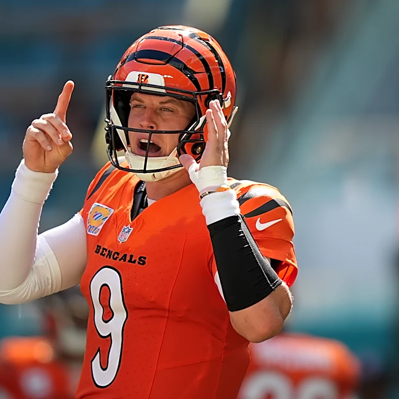 Burrow throws 4 TDs, Battle has pair of interceptions as Bengals beat Dolphins 31-24