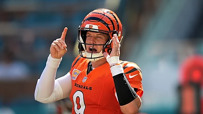 Burrow throws 4 TDs, Battle has pair of interceptions as Bengals beat Dolphins 31-24