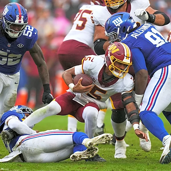 Jayden Daniels returns and scores twice, but overtime gaffe costs Commanders in 27-27 tie vs. Giants