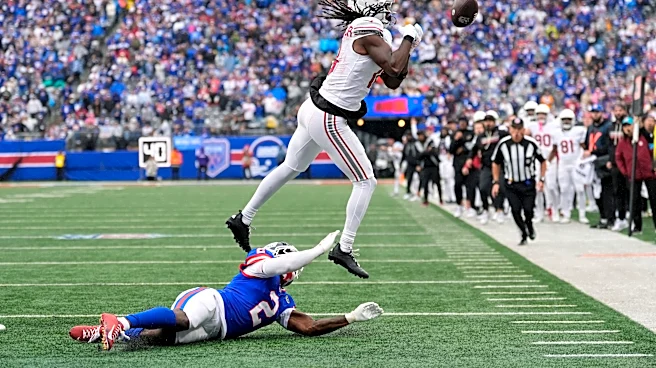 Cardinals end bizarre week by trading Harrison, getting thumped by Lions