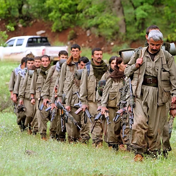 Kurdish PKK militants pull out of 4 camps in northern Iraq as part of peace process with Turkey