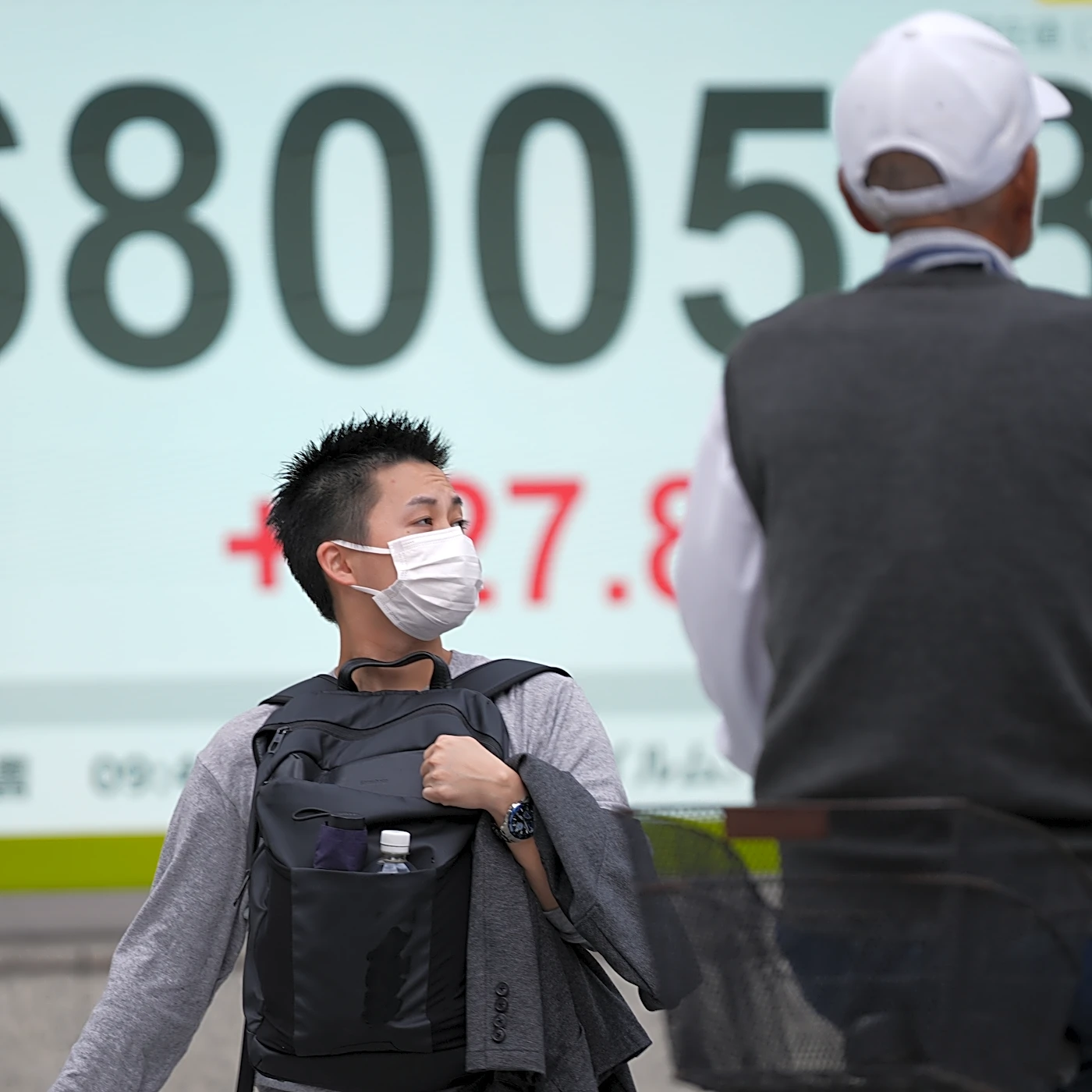 Asian shares trade mixed after US stocks edge back from their record after profit reports