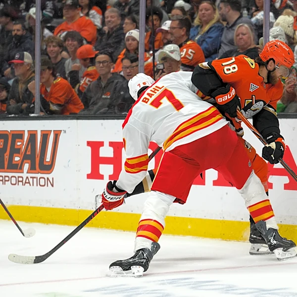 Pospisil's tiebreaking third-period goal pushes Flames to first win of the season, 4-2 over Ducks