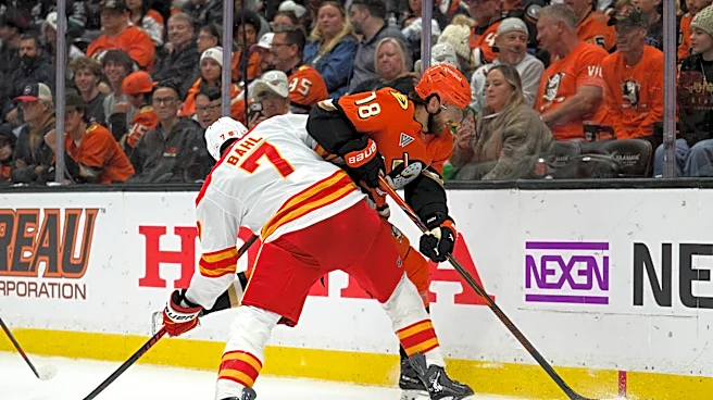Pospisil's tiebreaking third-period goal pushes Flames to first win of the season, 4-2 over Ducks