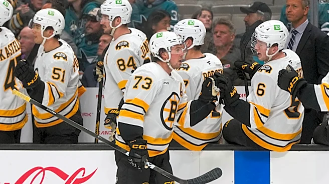McAvoy scores in his 1st game back from a suspension to lead the Bruins past the Sharks 6-3