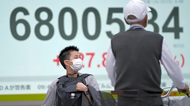 Global benchmarks are mixed in cautious trading after US stocks edge back from record