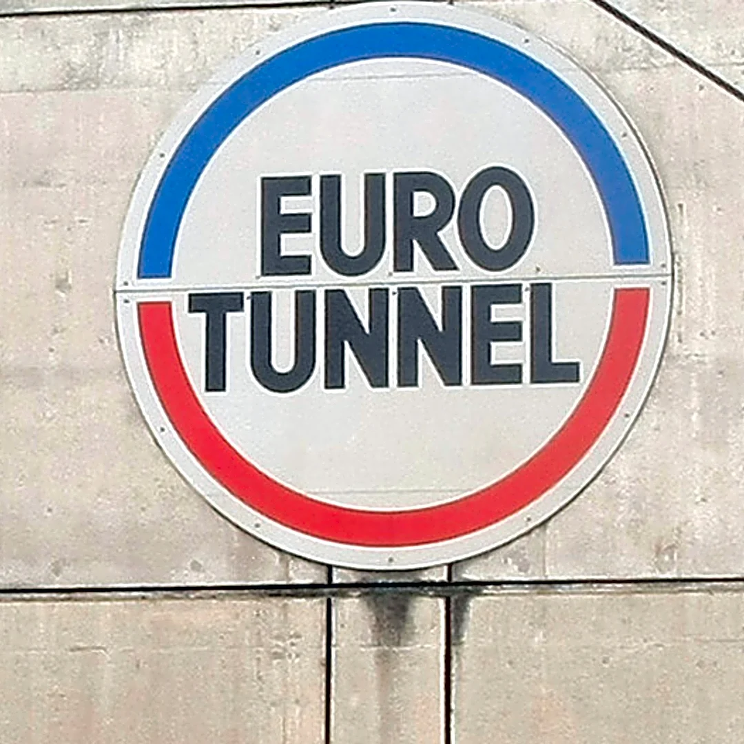 Minibus slams into Channel Tunnel shuttle train, injuring 19 and halting service