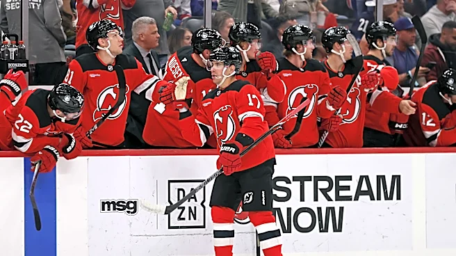 Devils score four goals in just over five minutes on the way to routing the Rangers 7-1
