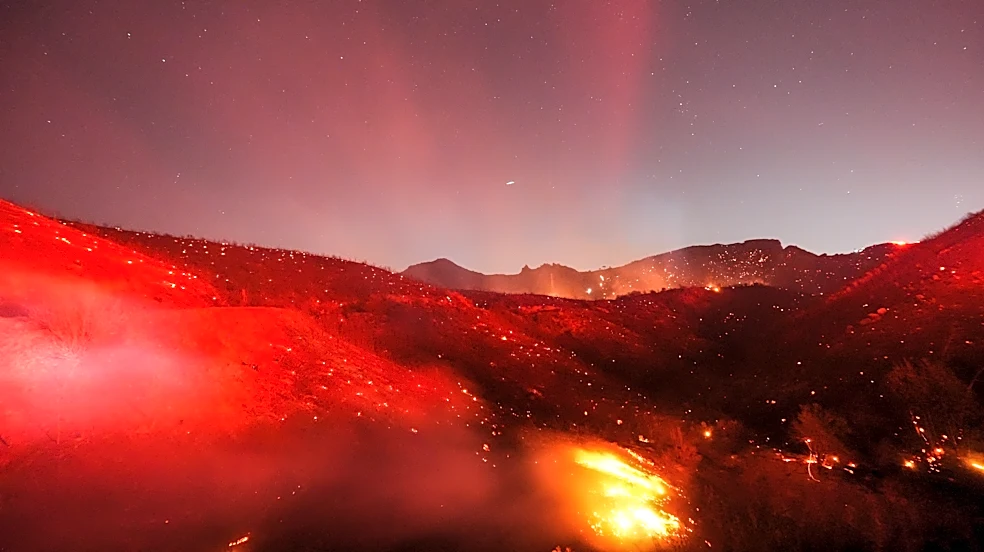 Hot, windy weather stokes brush fires in Southern California; power turned off for many