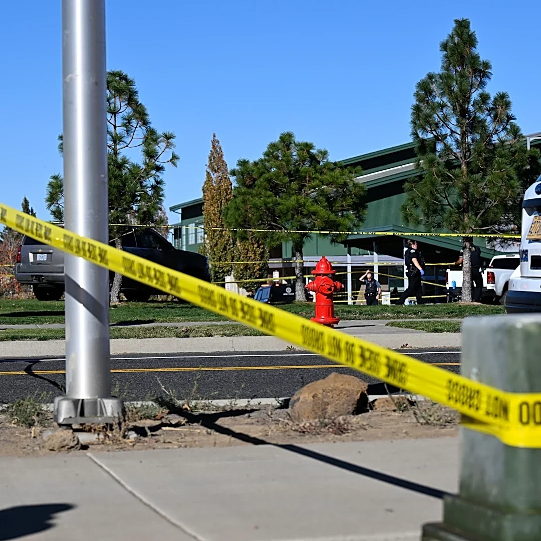 The Latest: Teacher threw cellphone and tackled gunman who killed 4 at Oregon school, police say