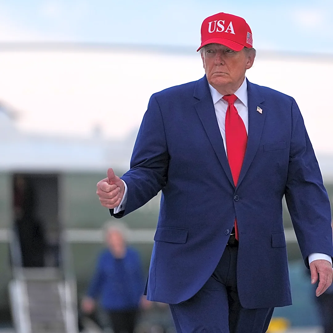 Trump puts new Russia sanctions passed by Congress on hold, saying waiver is in US national interest