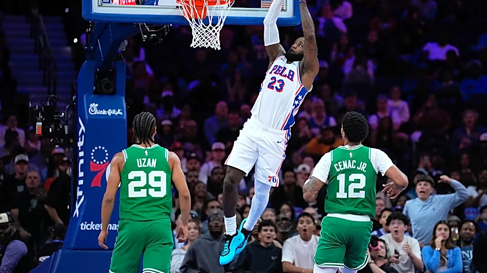 LeBron James calls helicopter rides 'transportation' after he soars on big dunk in 76ers home debut