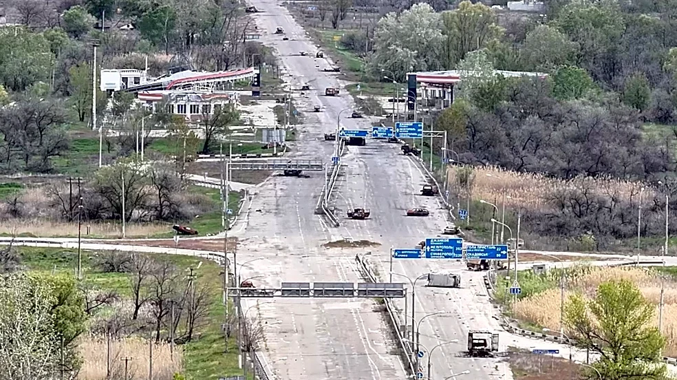 Desperate civilians risk their lives along mined roads to escape from a Russian-held city